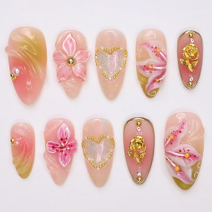 Kunstnagelset mit filigranen Blumendesigns und glamourösen Akzenten Brehn