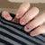 Kunstnagelset mit funkelnden Sternenverzierungen und eleganten Akzenten Brehn