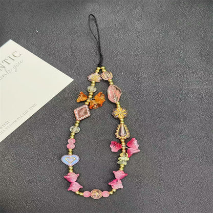 Blumenkette mit Perlen Brehn