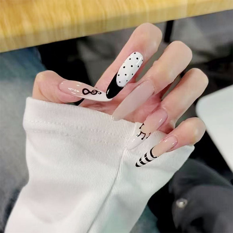 Künstlerische Lange Stiletto-Nagelverzierungen Brehn