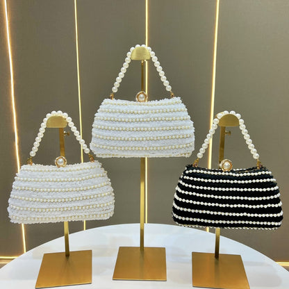 Elegante perlenverzierte Handtasche