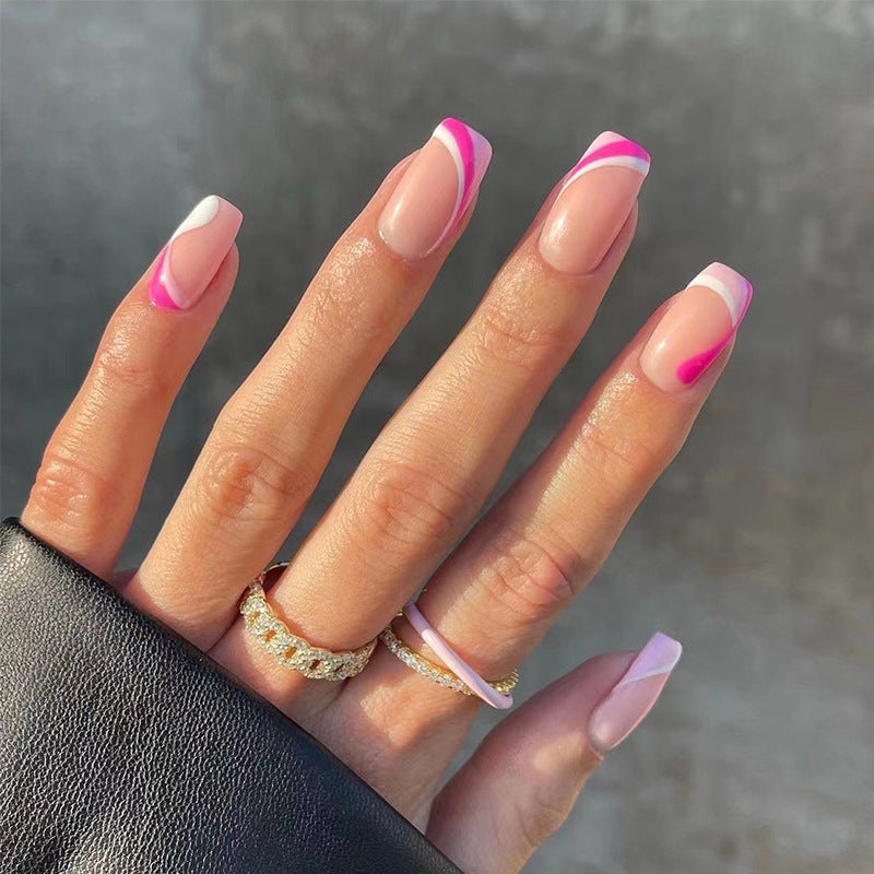 Kunstnagelverlängerungen mit elegantem Farbverlauf und geschwungenen Akzenten Brehn