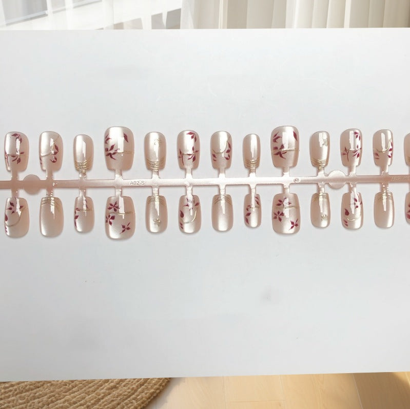 Künstlerisches Floral Press-On Nails Set Brehn