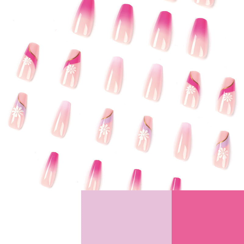 Kunstvolle Nagelverlängerungen mit buntem Ombre-Design und floralen Akzenten Brehn
