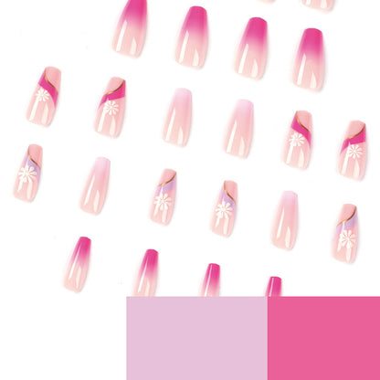 Kunstvolle Nagelverlängerungen mit buntem Ombre-Design und floralen Akzenten Brehn