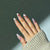 Elegante Stiletto Press-On Nagelset mit künstlerischem Blumenmuster Brehn