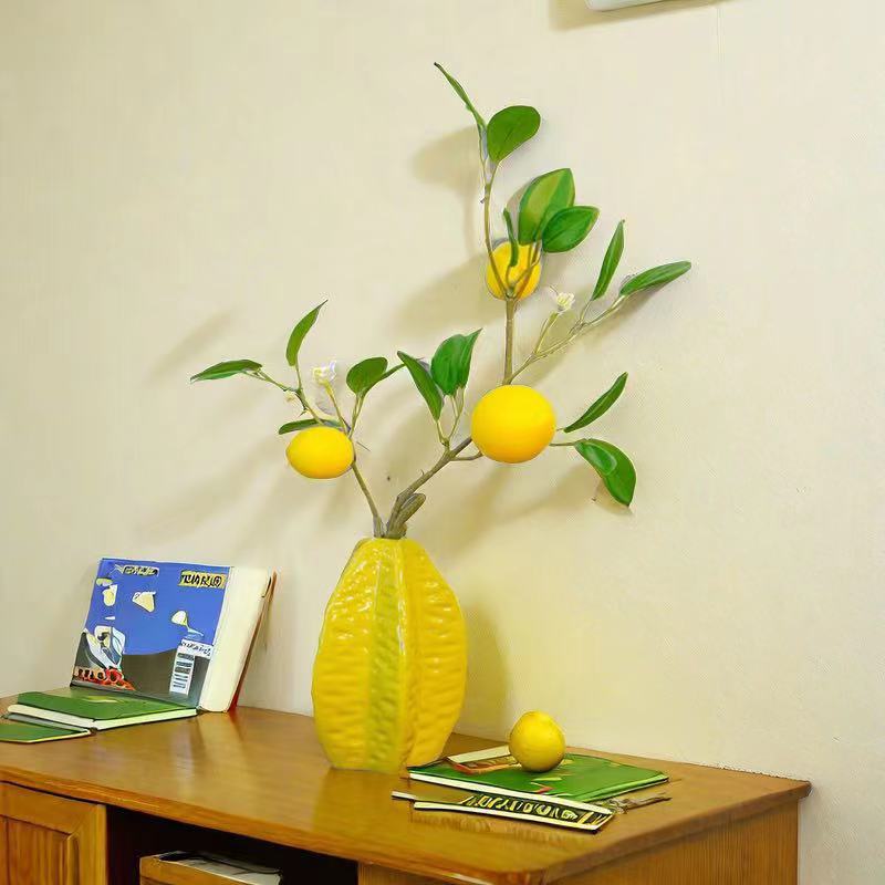 Dekorativer Zitronen-Mittelpunkt für die Wohnkultur