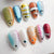 Kreatives Press-On Nagelkunstset mit bunten Fischdesigns Brehn