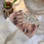 Kunstnagelset mit grafischen Mustern und elegantem Finish Brehn