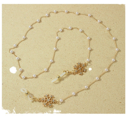 Elegante Brillenhalterkette mit Perlen und Schneeflockenanhänger Brehn