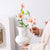 Dekorativer floraler Krug Vase