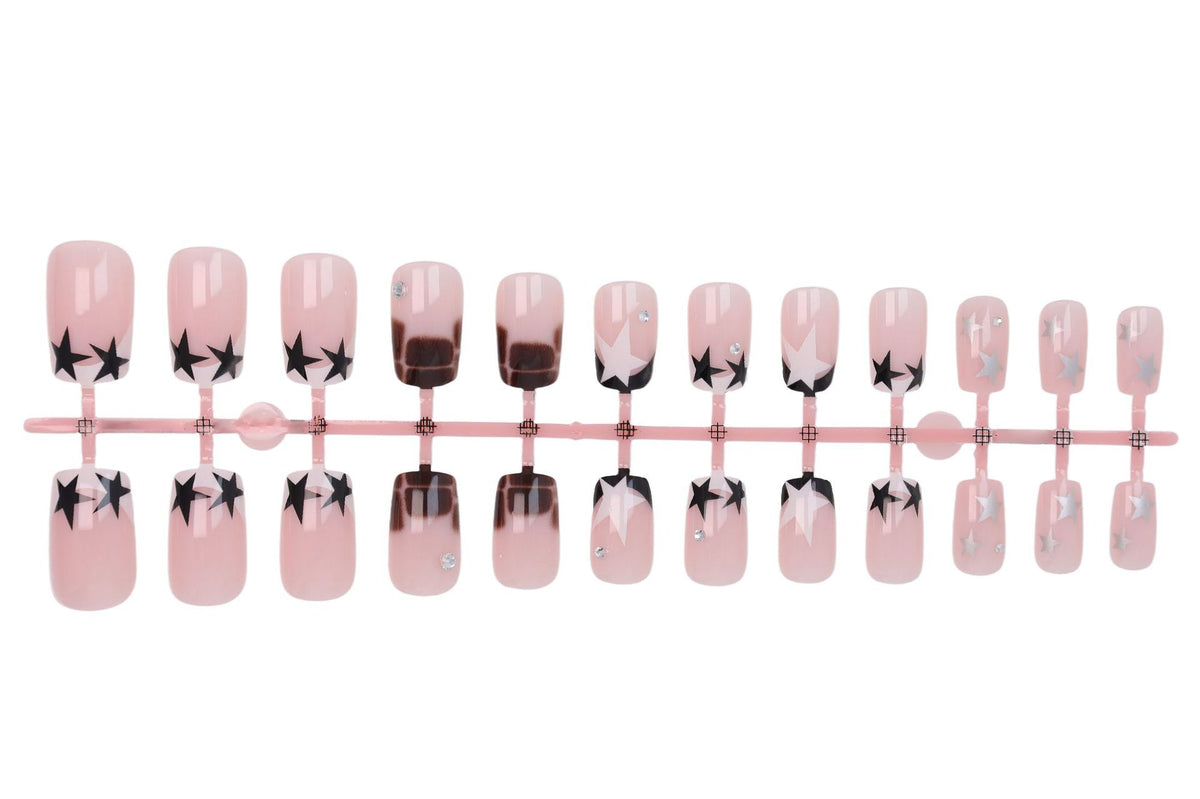 Kunstnagelset mit glamourösen Sternen- und Glitzerakzenten Brehn