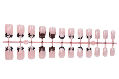 Kunstnagelset mit glamourösen Sternen- und Glitzerakzenten Brehn