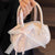 Elegante Handtasche mit Schleifendetail Brehn