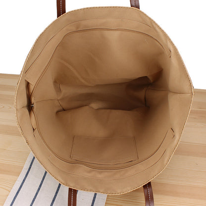 Trendige Strandtasche Aus Geflochtenem Bast und Lederakzenten Brehn