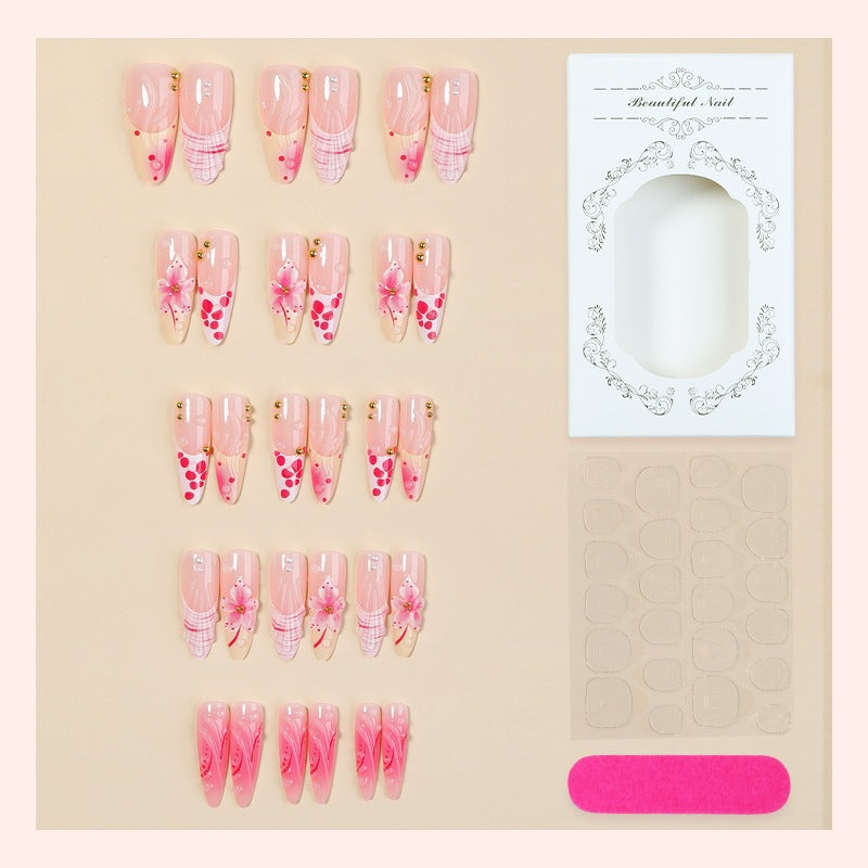 Kreatives Kunstnagelset mit floralen und glitzernden Akzenten Brehn