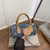WoPlayful Bow-Printed Mini-Handtasche Brehn