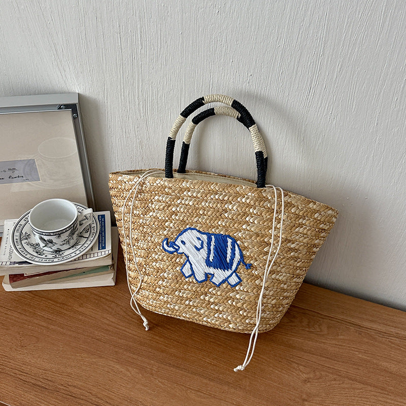 Bestickte Strohmärktasche