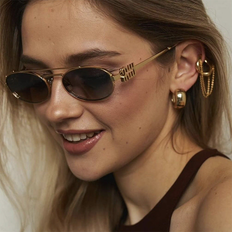 Damen elegante ovale Sonnenbrille mit luxuriösem Metallrahmen Brehn