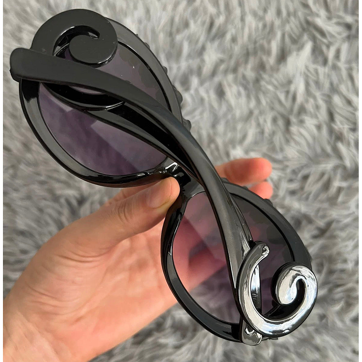 Damen Sonnenbrille mit floralen Akzenten Brehn