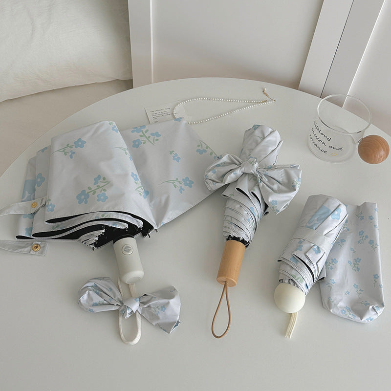 Damen Faltender Regenschirm mit stilvollem Blumendesign Brehn