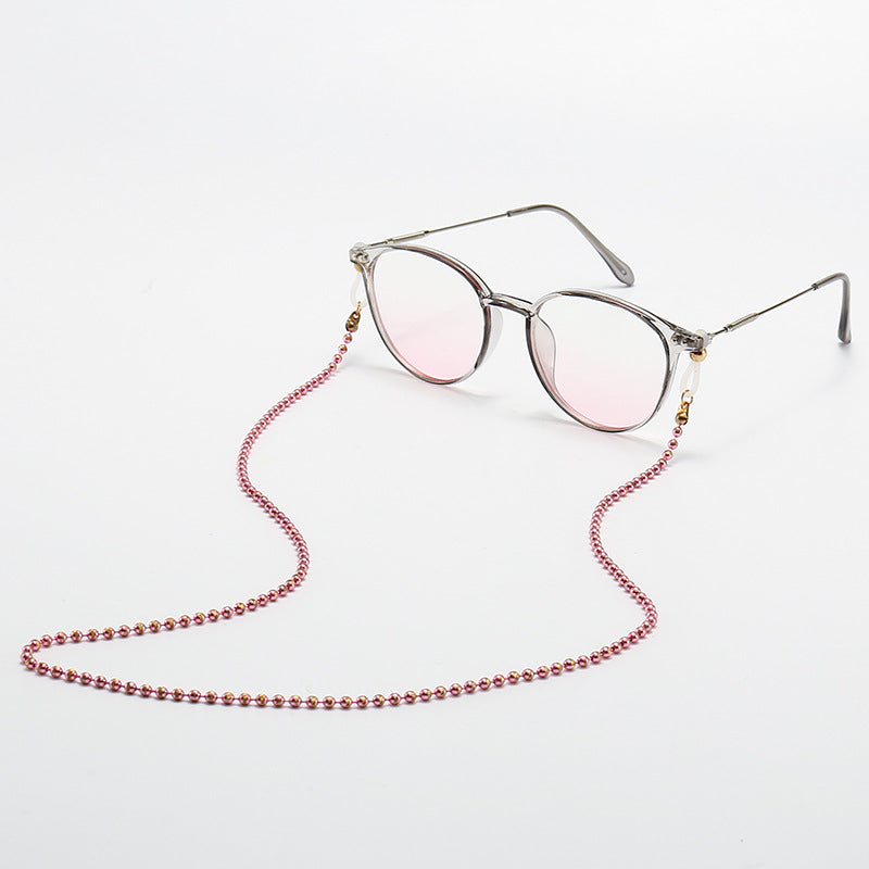 Modische Katzenaugenbrille mit Perlenkette Brehn