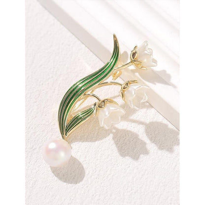 Elegante Blütenbrosche mit Perlenanhänger Brehn