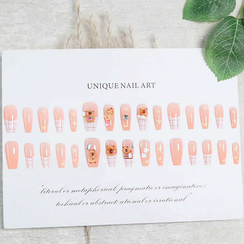 Kunstnagelset mit charmantem Tierdesign und funkelnden Kristallverzierungen Brehn