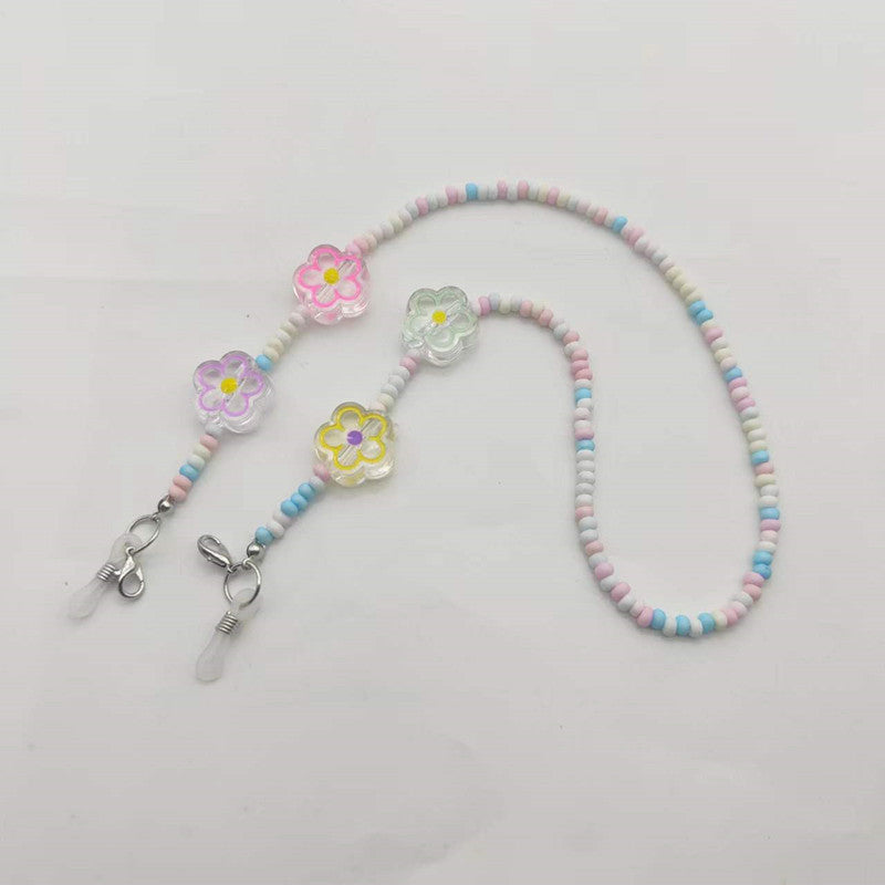Verspielte Brillenhalterkette mit Blumenanhängern Brehn