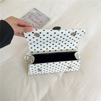 Punktemuster Clutch Handtasche