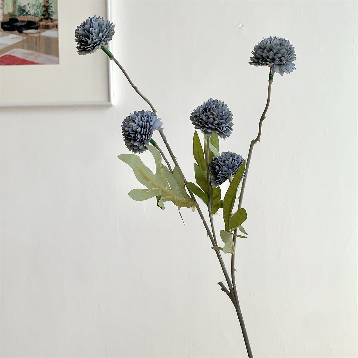 Dekorativer Blumenspross für die Wohnkultur-Darstellung