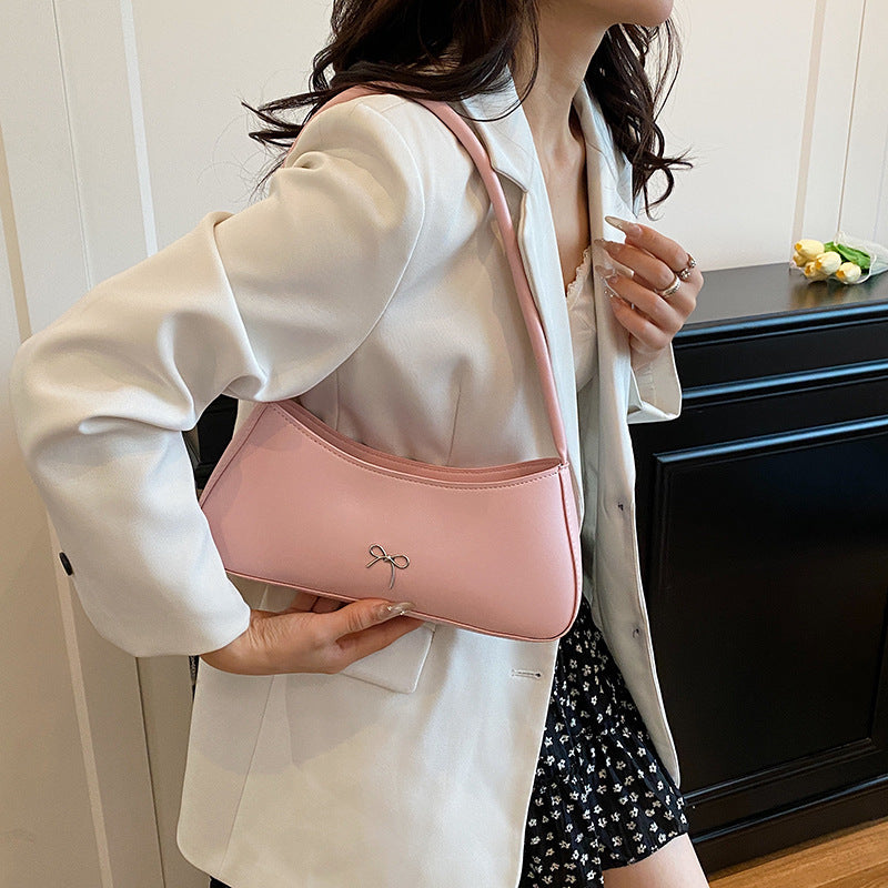 Elegante geschwungene Handtasche Brehn