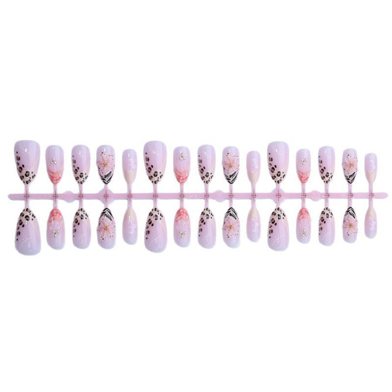 Kunstnagelset mit floralen und Leoparden-Designs Brehn