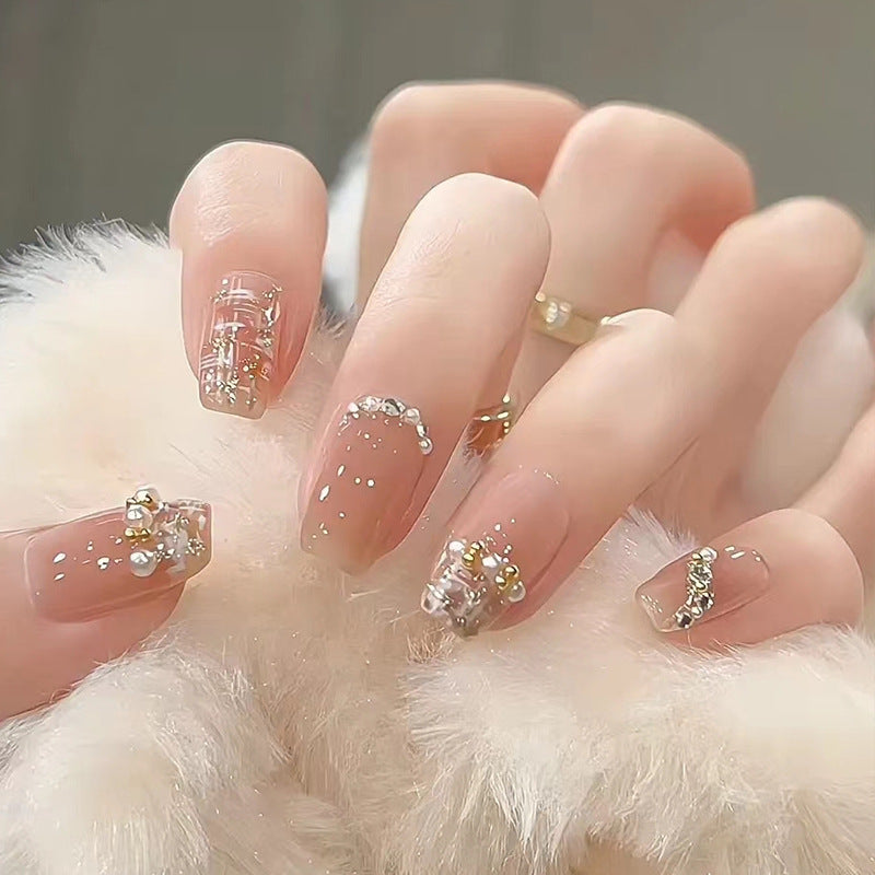 Kunstnagelset mit funkelnden Glitzer- und holografischen Akzenten Brehn