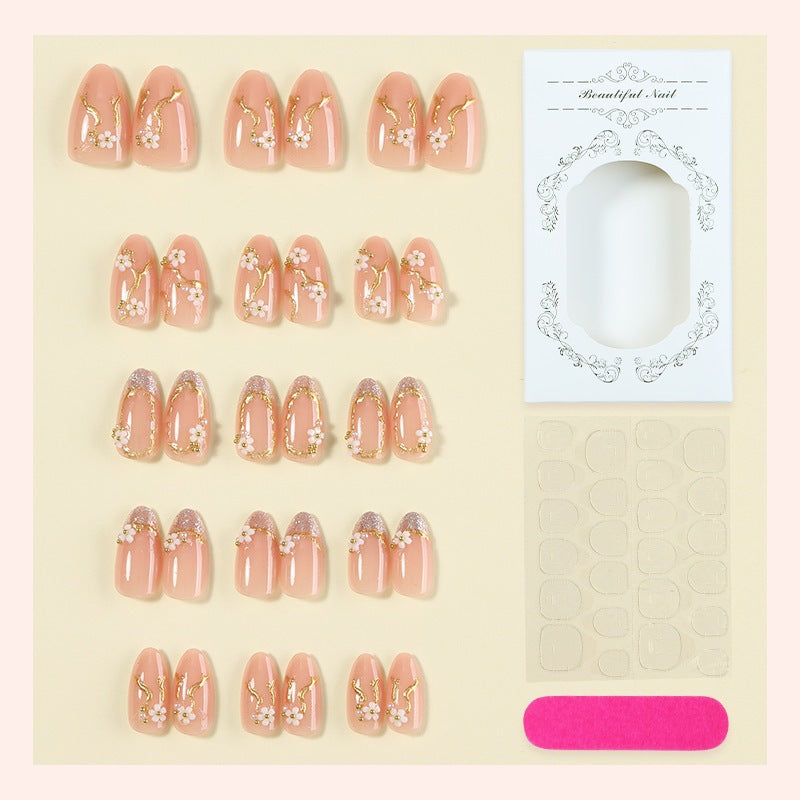 Kreatives Kunstnagelset mit zarter Blumendekoration und Glitzerelementen Brehn