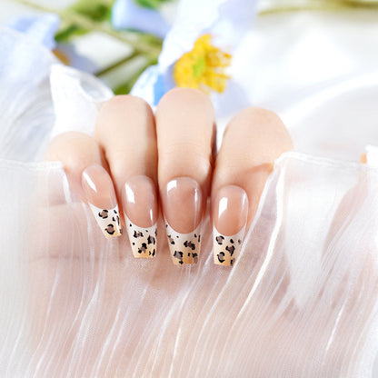 Stylische French Tip Press-On Nägel mit Tierdruck Brehn