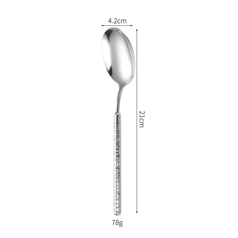 Eleganter Dessertlöffel mit Kunstvollem Griffdesign Brehn