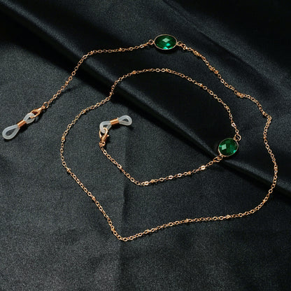 Eleganter mit Edelsteinen verzierter Brillenhalter Brehn
