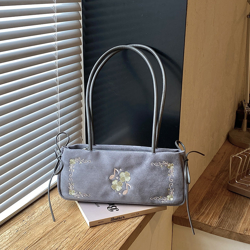 Bestickte Wildleder-Handtasche