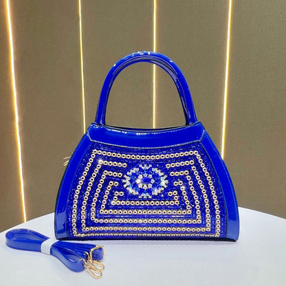 Verzierte gepolsterte Abendhandtasche