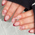 Kunstnagelset mit elegantem Bogen-Design und Glitzereffekten Brehn