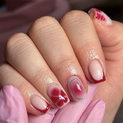 Kunstvolle Nagelkunst mit Farbverlauf und Glitzer Brehn