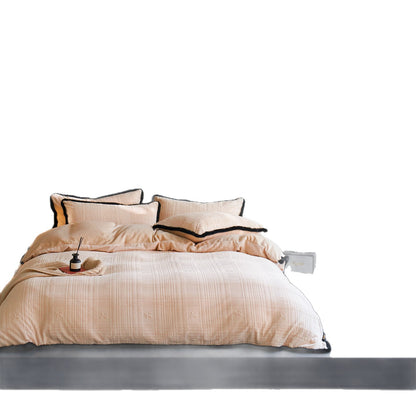Hochwertiges Steppbett-Set mit geprägtem Karo-Jacquard und Kunstfell-Saum