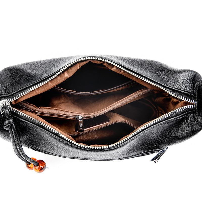 Lässige strukturierte Leder-Slingtasche Brehn