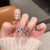 Künstlerisches Press-On-Nagelset mit einzigartigen Designelementen Brehn