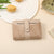 Texturiertes Multi-Topf-Snap-Verschluss-Wallet Brehn