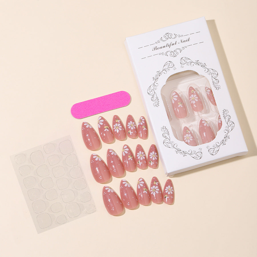 Kunstnägel Set mit eleganten Blüten und Glitzerakzenten Brehn