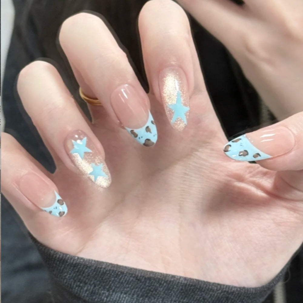 Themen Press-On Nail Set mit Stern- und Tierdruck Brehn