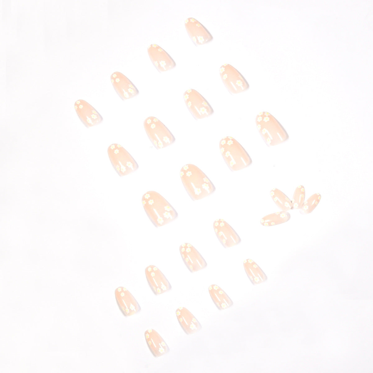 Künstliche Nagelkunst mit floralem Design und Glitzerakzenten Brehn