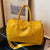 Elegante Handtasche mit Luxuriösem Kroko-Muster und Bunten Applikationen Brehn